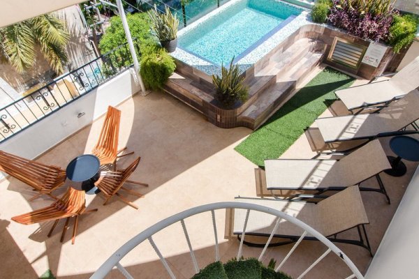 Suites Corazón Hotel