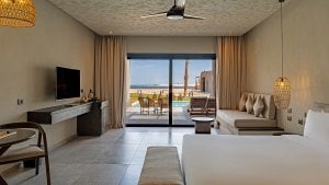 Swim-up suite beach front sea view