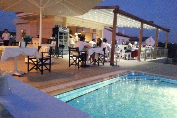 Kamer Suites & Hotel