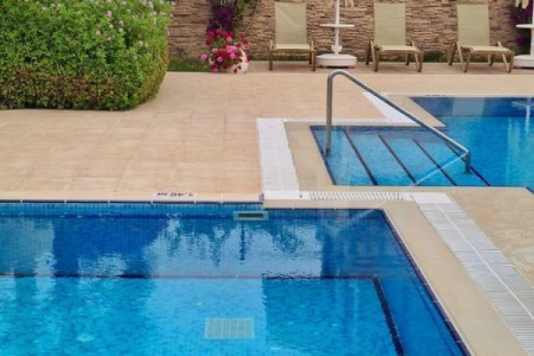 Kamer Suites & Hotel